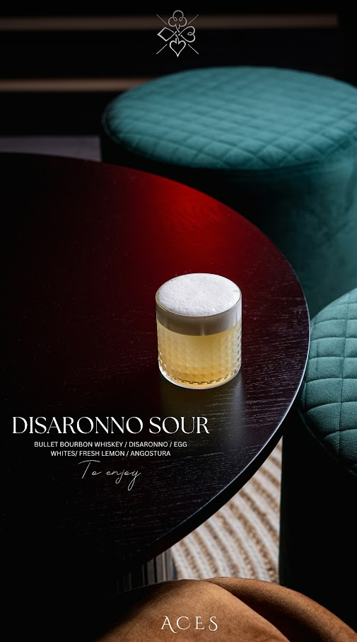 Disaronno Sour — Bulleit bourbon, Disaronno, egg white, lemon, Angostura
