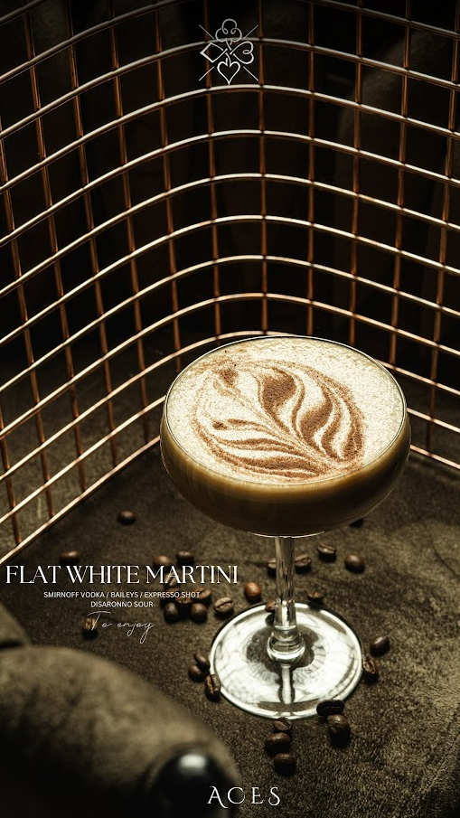 Flat White Martini — Smirnoff vodka, Baileys, espresso, Disaronno